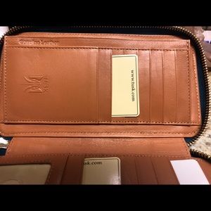 Turquoise blue leather Tusk wallet never used